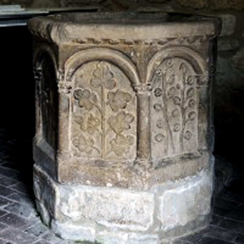 a row of tiny floral motifs beneath the upper rim