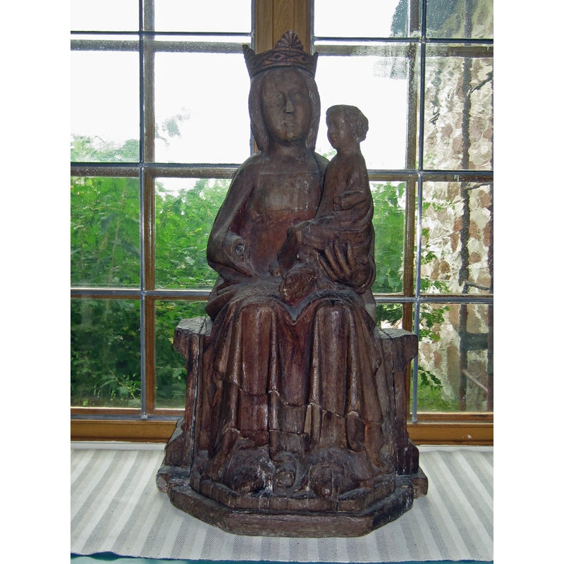 wooden Madonna i Eckerö described as originally ca. 1300 with later modifications by Åsa Ringbom in Kyrkor.ax [www.kyrkor.ax/kyrkor/eckero-kyrka/] [accessed 11 August 2017]: "Bland de medeltida skulpturerna märks främst en gotländsk madonna från ca 1300 i långhusets nordfönster, sedermera omarbetad för att motsvara den senmedeltida tidsandan. Madonnans krona i trä är av modernt ursprung."