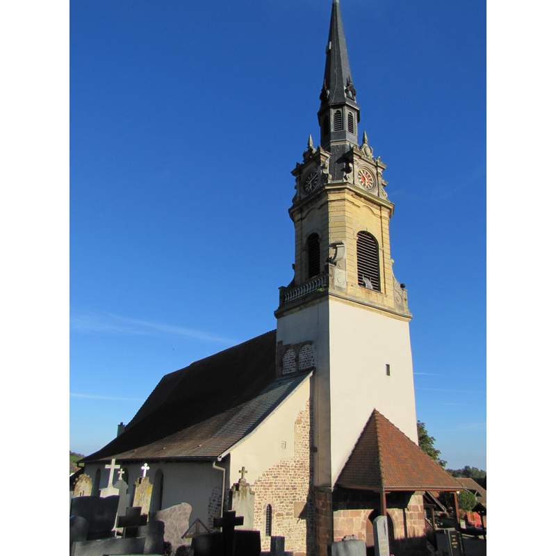 Source caption: "Église Sainte-Colombe, Vue extérieure sur le clocher avec son horloge de 1765".