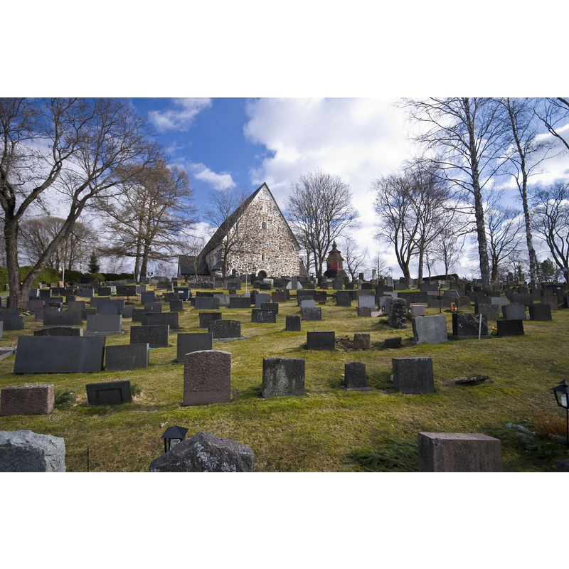 view of church, bell tower and churchyard