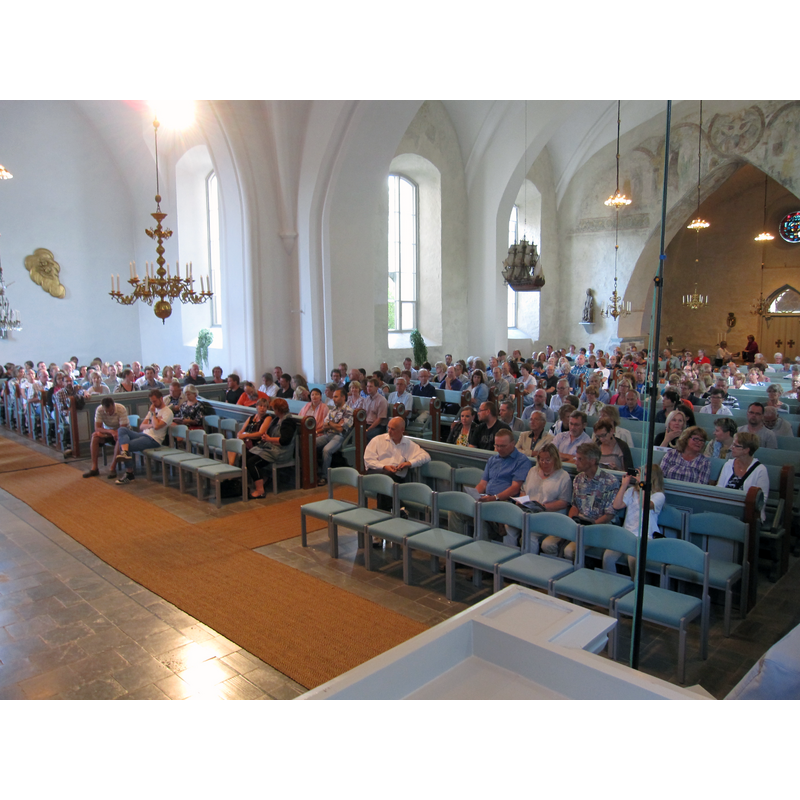 the interior of the church during an organ concert