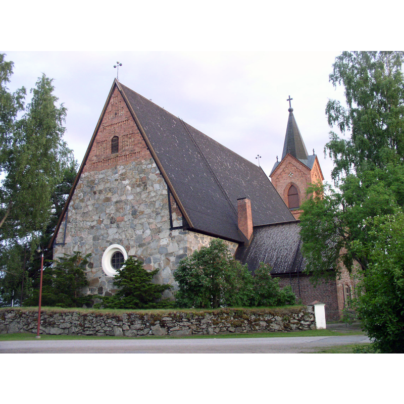the present church is late-18thC; the detached bell tower was added in 1811