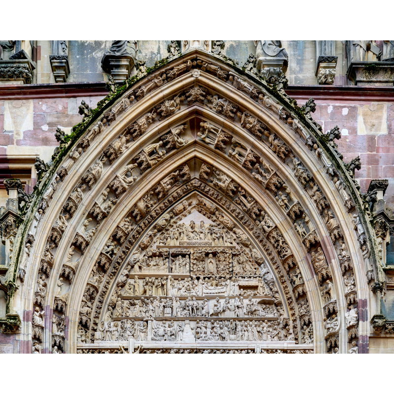the main tympanum of the west portal [NB: This image is a panorama consisting of multiple frames that were merged in software. As a result, this image necessarily underwent some form of digital manipulation]