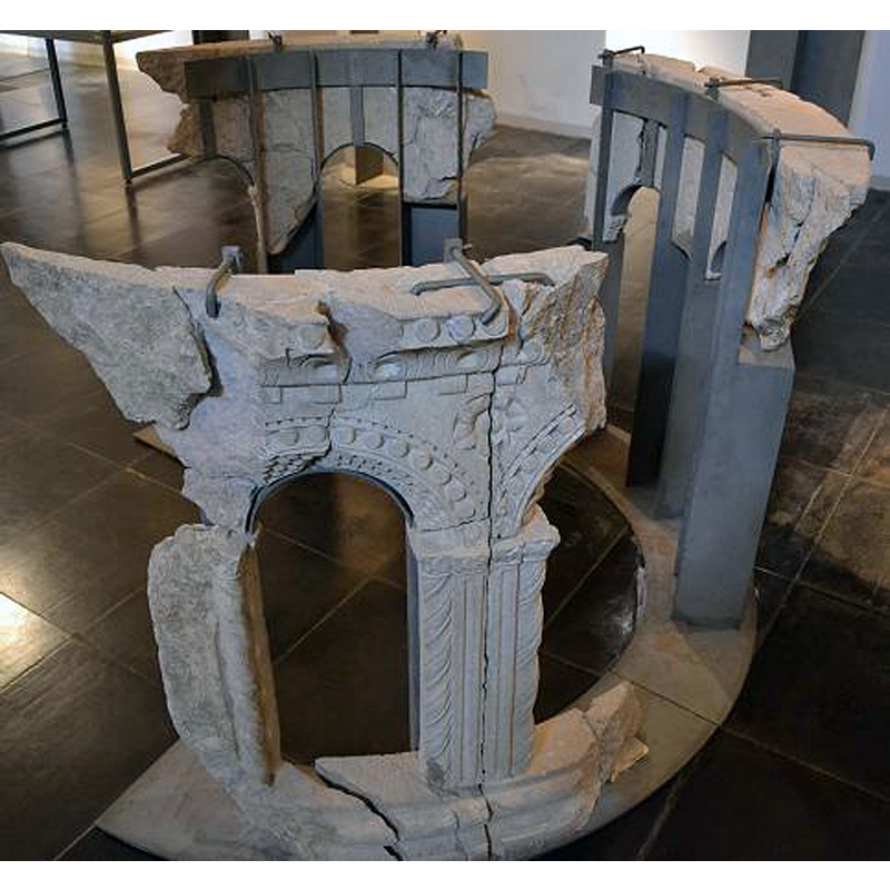 a fragment of "mobilier liturgique" from Cluny III housed now in the Musée d’Art et d’Archéologie [aka Musée Ochier], located in the Palais Jean de Bourbon -- although probably not a font [a well-head?] it could well have been one