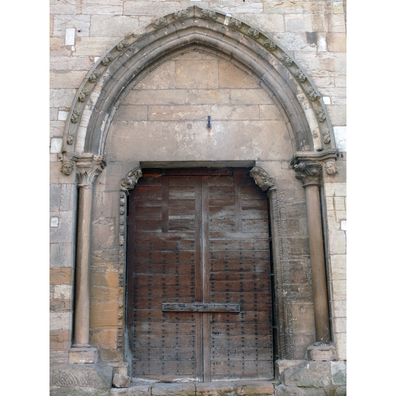 Source caption; "Cluny - Eglise Notre-Dame - Porte latérale".