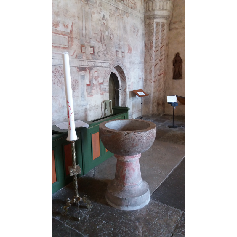 atop the conical pedestal of the base