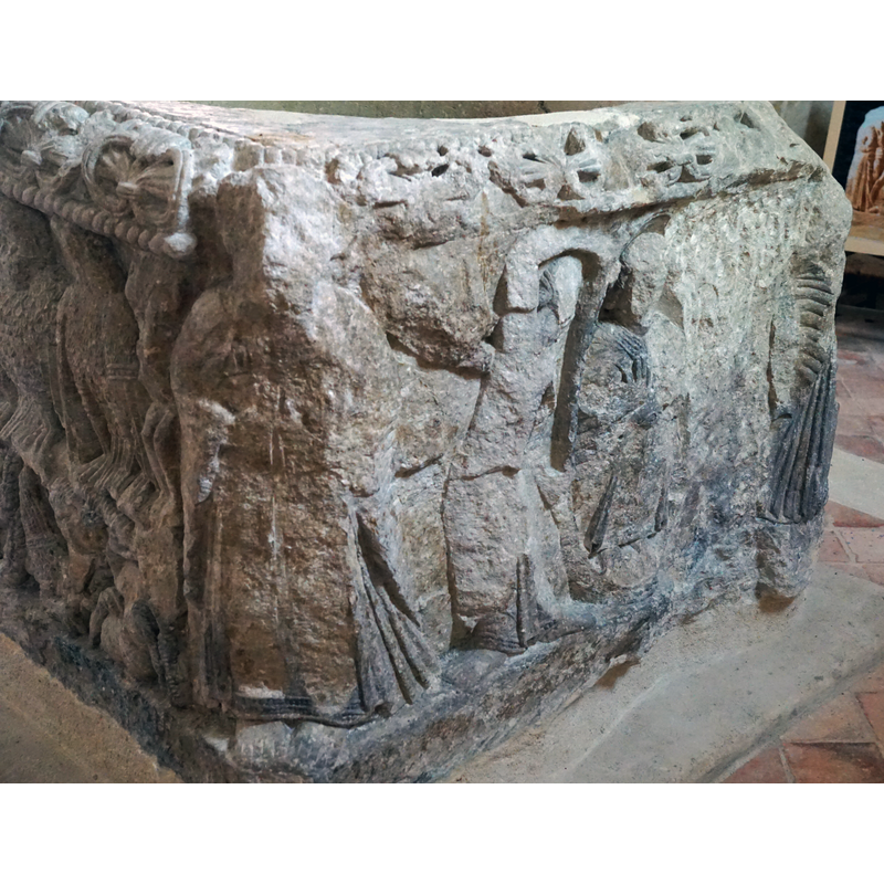 on the north side of the basin; very damaged; only one angel visible and the whole right side destroyed