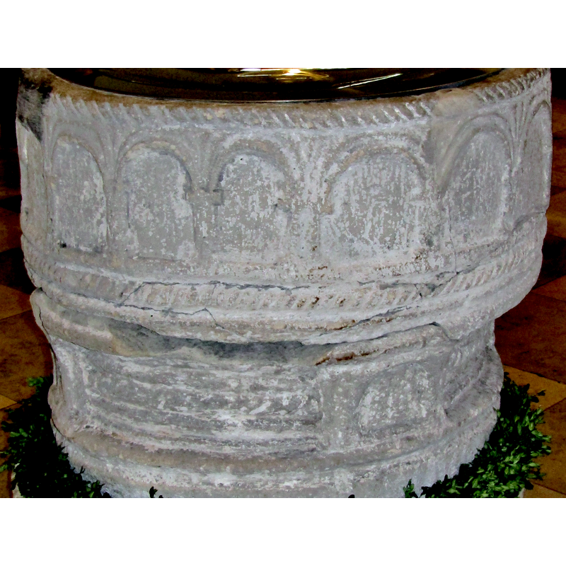 the medieval Bentheim font -- showing some of the damage on it