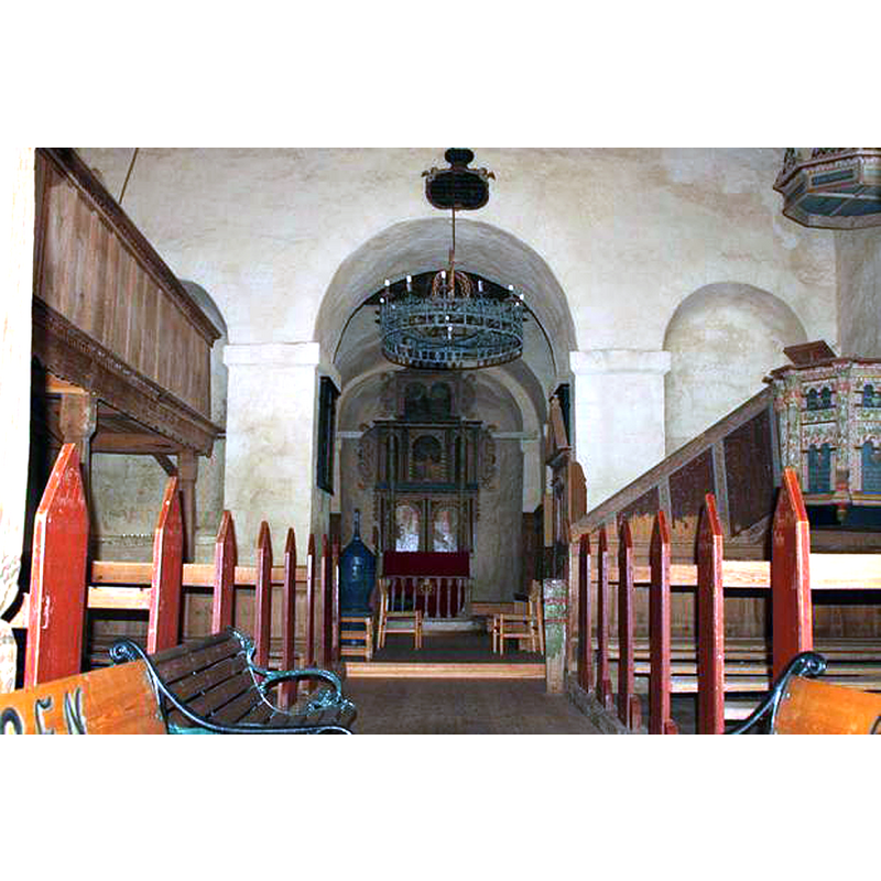 the font is visible at the far [east] end, left [north] side of the chancel