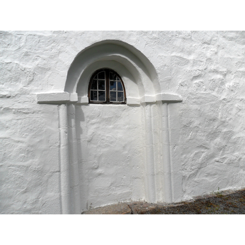 the blocked south portal; the only entrance into the church is now from the west