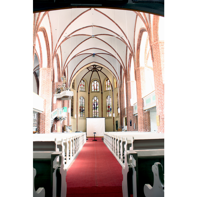 the altar is hidden by the large scree being used for a display at the time of our visit