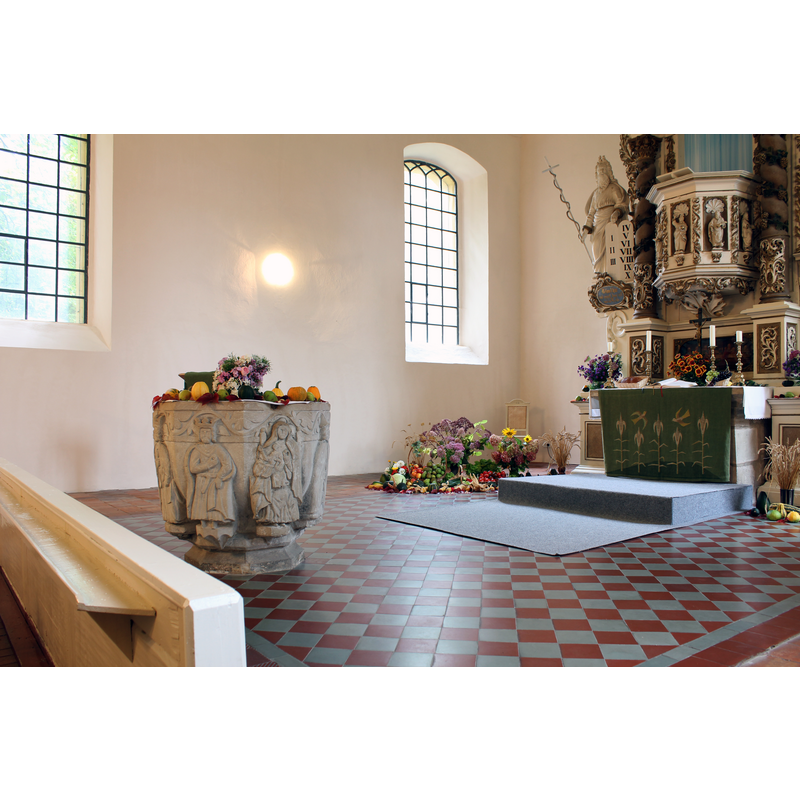 at the east end of the nave