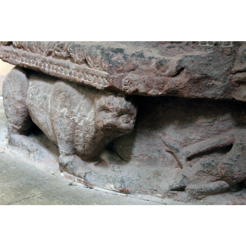 passant to the right; the figure partially visible on the right is the third symbol of the rivers of Paradise