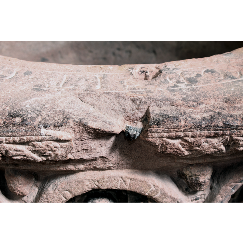detail of an old cover metal anchorage point and the damage caused to the stone