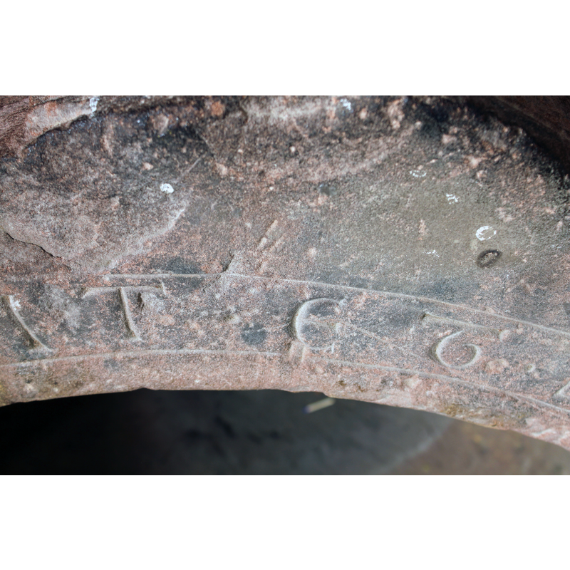 seen as the stone carver would have seen it standing inside the basin