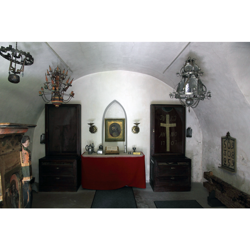 Source caption: "Interior of Savilahti stone sacristy in Mikkeli. The only remains of an old wooden church, the sacristy now serves as a museum."