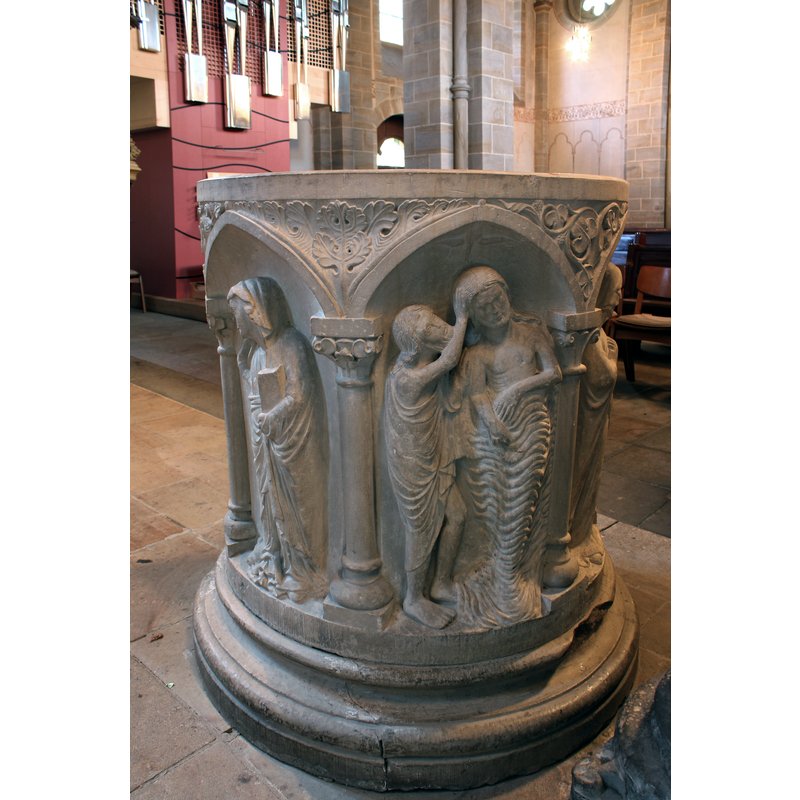 Mary holding a book in the left arch, part of the Annunciation scene; John the Baptist and Christ; Christ appears to 'wear' the waters of the Jordan