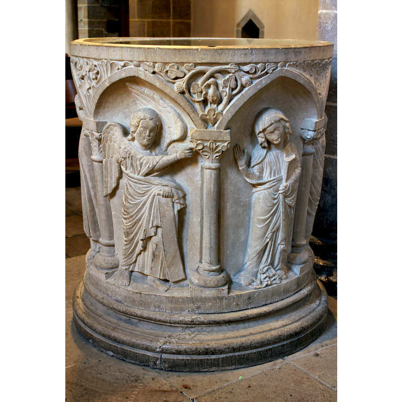 seen here in the left (Gabriel) and centre (Mary) atches of the font [how much a re-carving? -- cf. FontNotes]