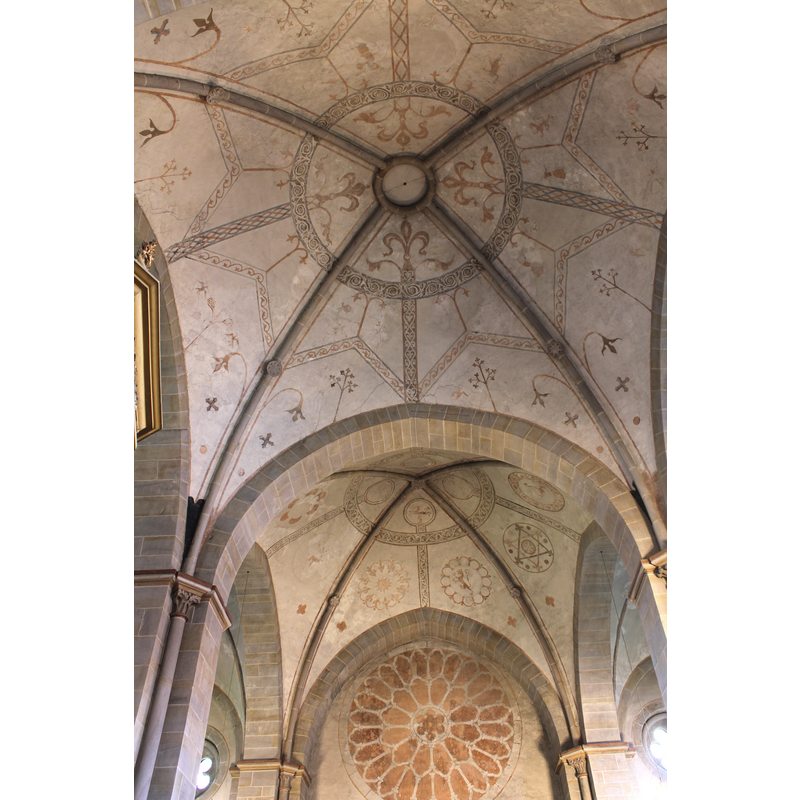 The ceiling at the west end of the nave; the rosette is on the west wall, above the west entrance way.