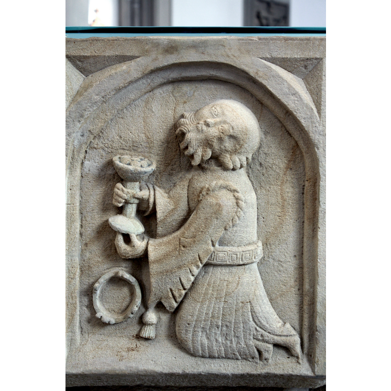 this is surely the first [i.e., nearest] Magus of the Adoration of the Magi scene; a crown is on the floor before him