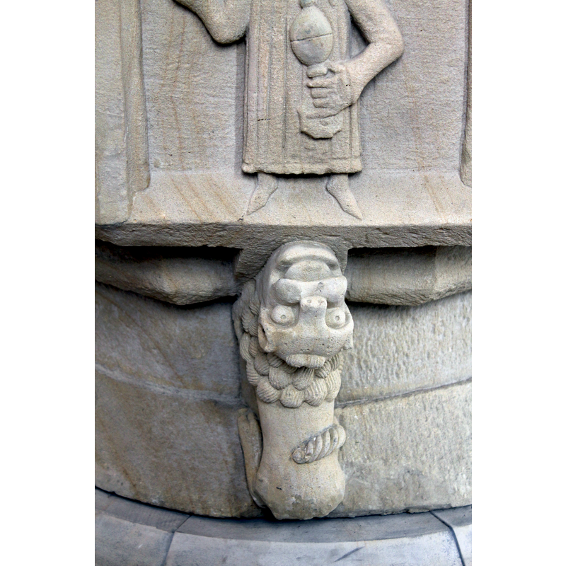one of four such; this one below the secomg Magus of the Adoration scene on the basin