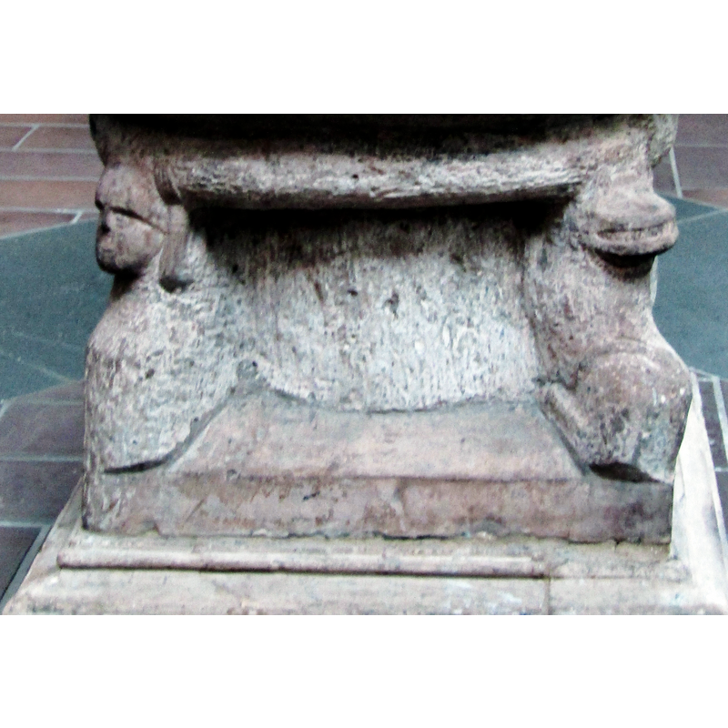 at the upper end of the lower base