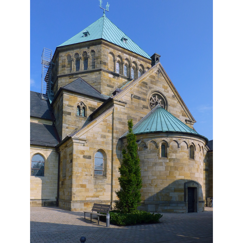 both transepts have round apses; the east end of the church does not