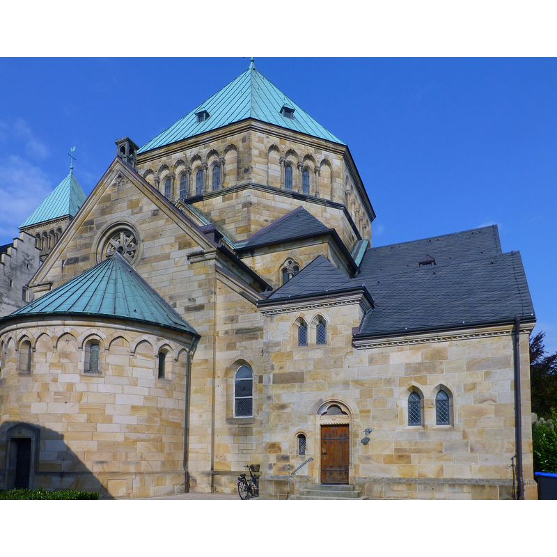 the round apse belongs to the south transept; the portal visible to the right of it leads into the chancel