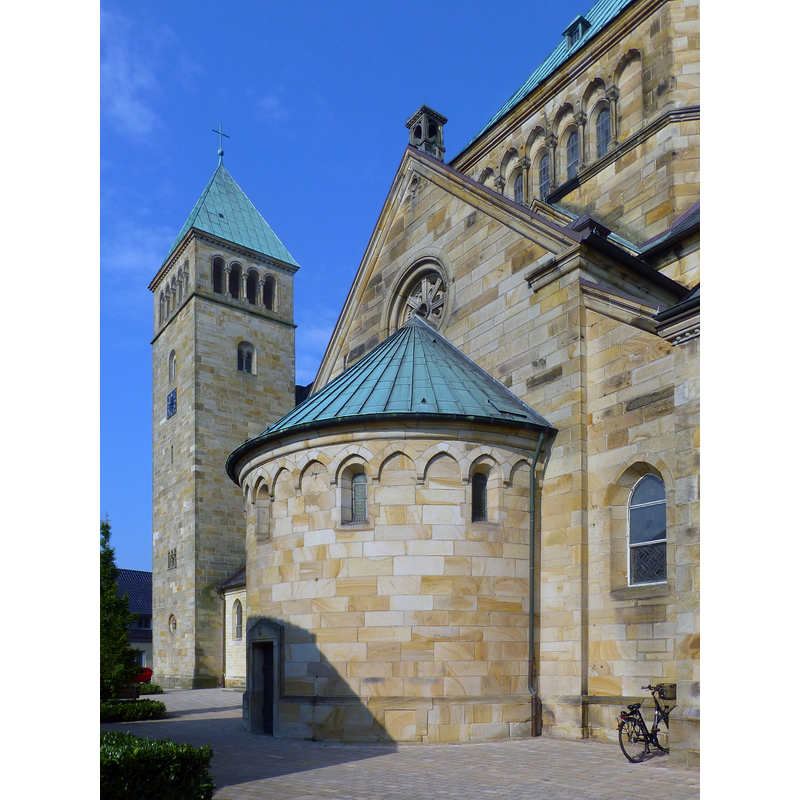 both transepts have round apses; the east end of the church does not
