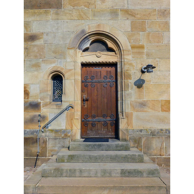 the portal leads into the south side interior of the chancel