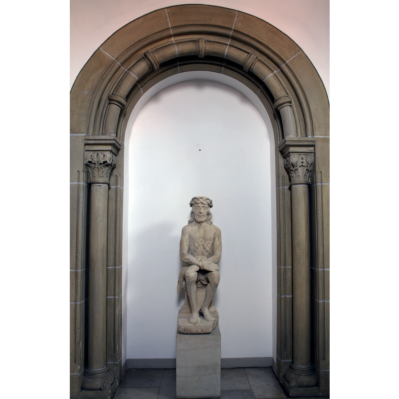 in a north chapel, at the west end