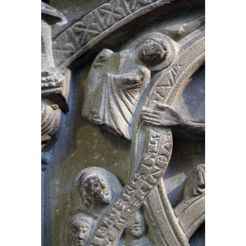 demi-angel, Matthew's symbol, the wings above jammed above below the arch-head; niotice the inscription (?) between Matthew's haloed head and Christ's right hand; inscribed scroll below