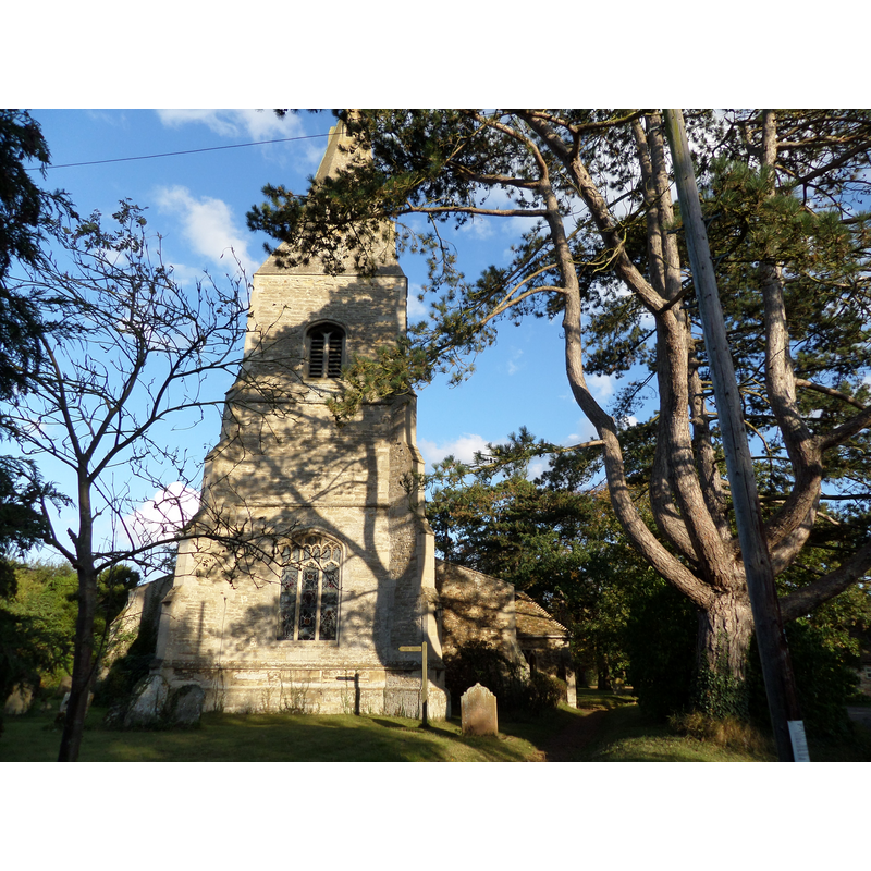 Source caption: "West tower and spire of All Saints parish church, Broughton, Cambridgeshire, (formerly Huntingdonshire), seen from the west".