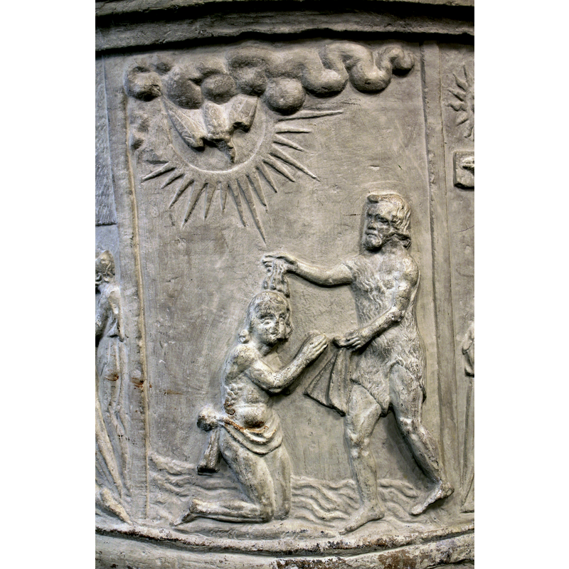 Christ kneeling; John the Baptist pours water with a naked hand over Christ's head