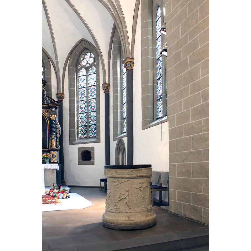 the font in the south side of the chancel
