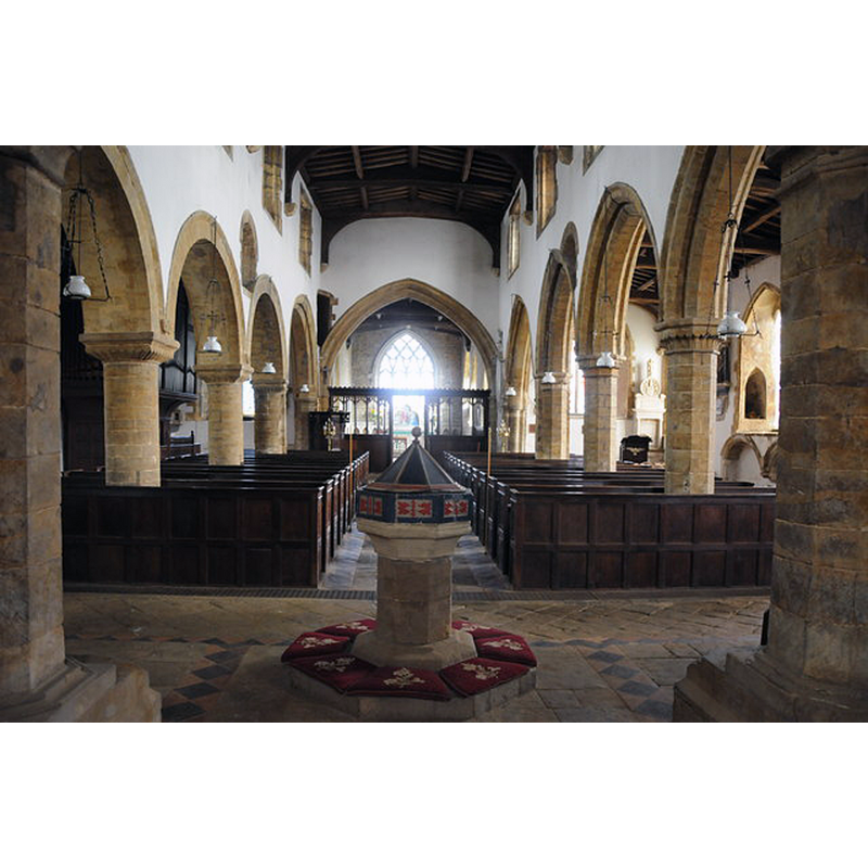 looking east from beneath the tower, with the font and cover just ahead