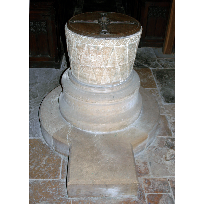 the old basin on a new base and plinth; the cover is modern, as well