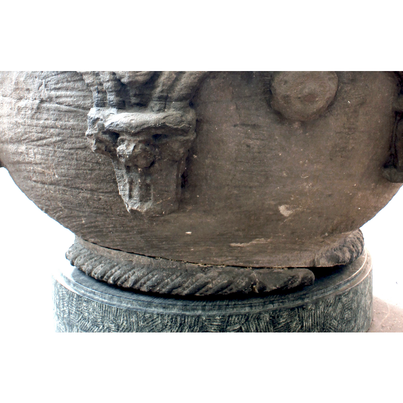 showing the damage to the moulding and lower basin side, on the north side
