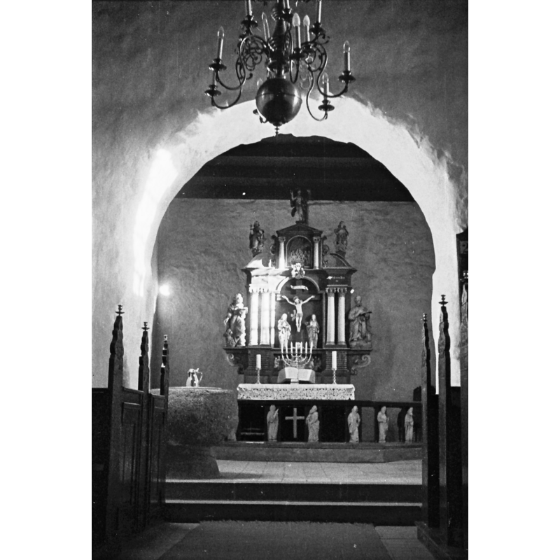 looking into the chancel, with a partial view of the medieval font