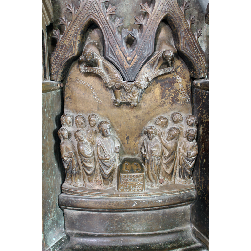 on the ground, in the centre of the image an altar has the footprints of a Christ who is already on his way to Heaven [only the feet and lower edge of the clothing are visible]; the front of the altar is inscribed "+ASCEN[...]"; 12 Apostles present, of whom Paul holds a sword amd Peter, whose head is tonsured, holds a key; in the trefoiled arch-heads atop hold inscribed scrolls "[...] +VIRI GALILEI [...]; additional scrolls read "ASSV[N]TVS EST QVID [...]"