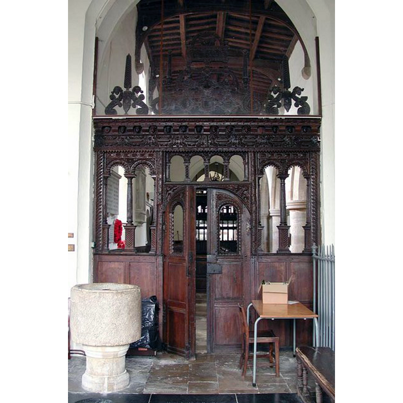 the Norman font by the east side of the chancel screen