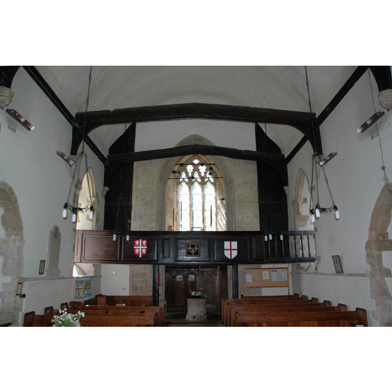 Source caption: "Church of England parish church of St Denys, Northmoor, Oxfordshire: interior of nave, looking west to the tower, 14th-century west window and late 17th-century west gallery."