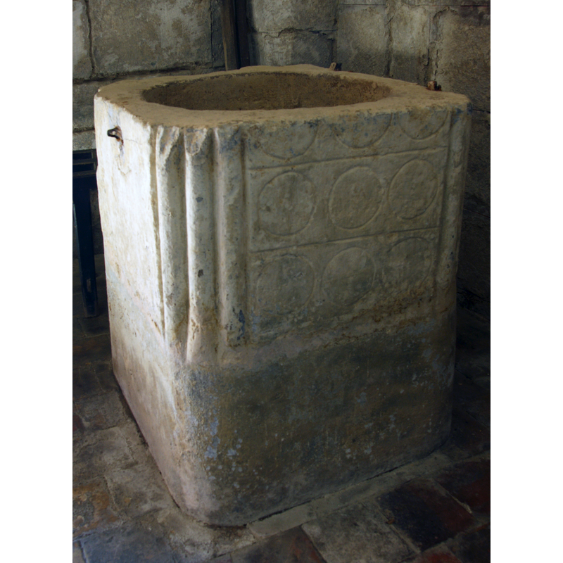 two and a half rows on the front side here, and indication of the fragmentary nature of this fonrt -- notice the metal staples -one on the left side, two on the right- that were used to anchor an old font cover