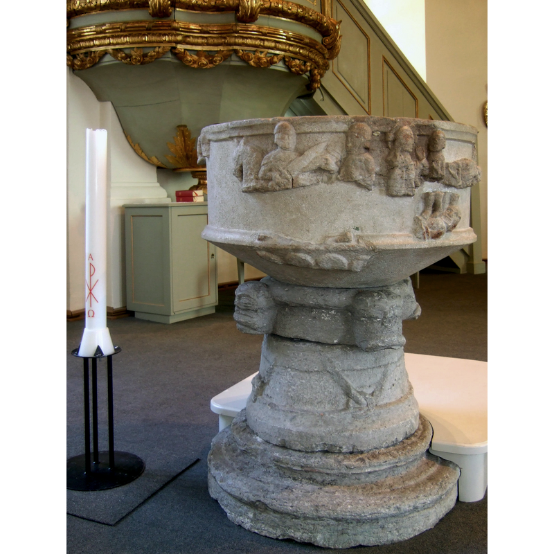 the pulpit is behind the font