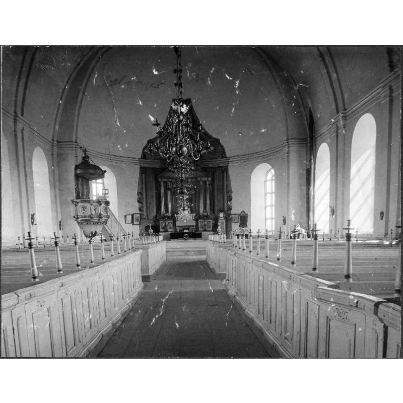 [NB: the photograph probably dates from before 1928, the time when the fragments of the old font were discovered in the churchyard and reconstructed into the present font]