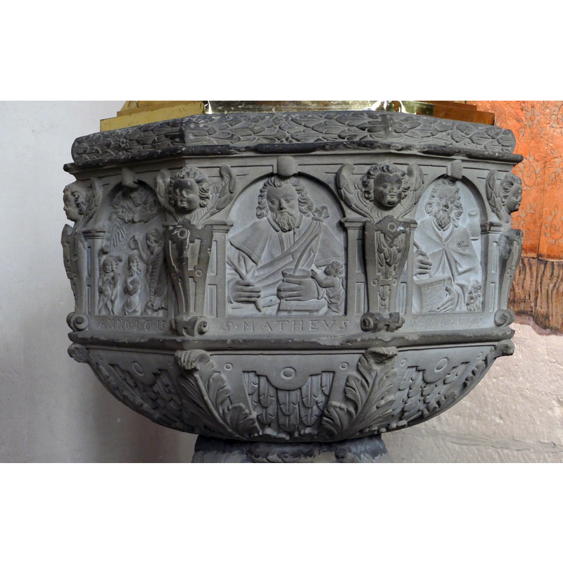 seen here in the centre panel, to the right of the Baptism of Christ scene