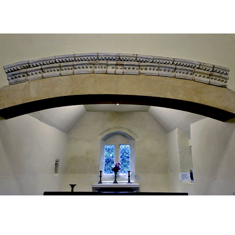 Source caption: "Markby, St. Peter's Church: Fragments of dogtooth from the old priory set into the chancel arch".