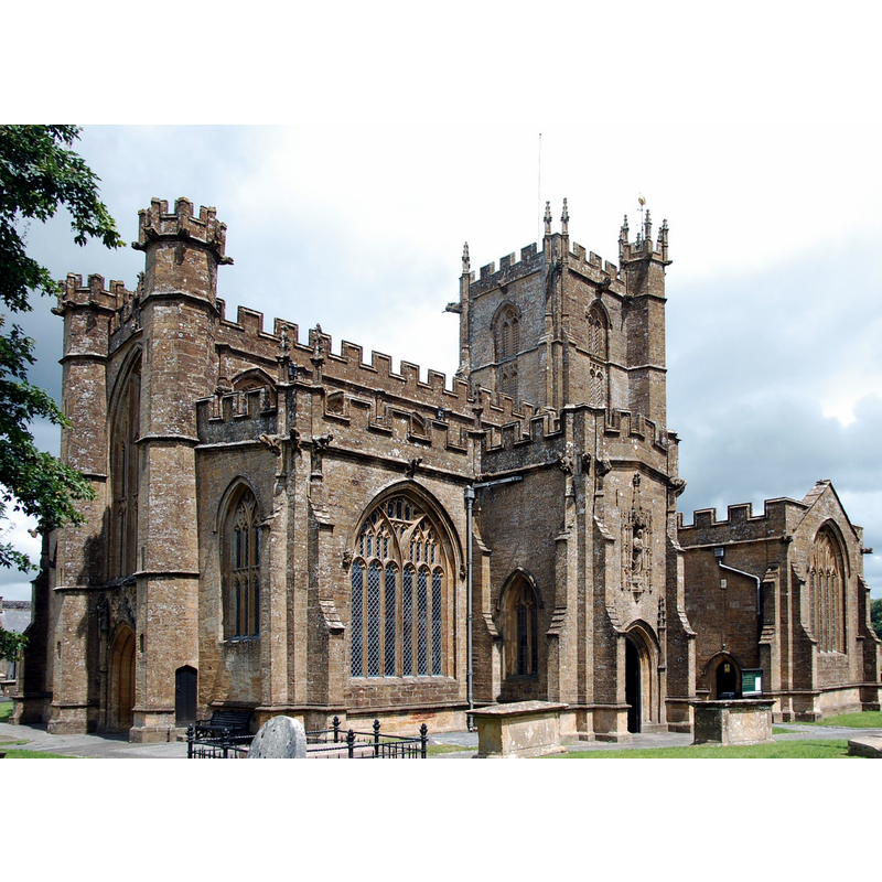 Source caption: "St Bartholomew's Church, Crewkerne. The classic view from the south-west of the spectacular Perpendicular church with its enormous windows".