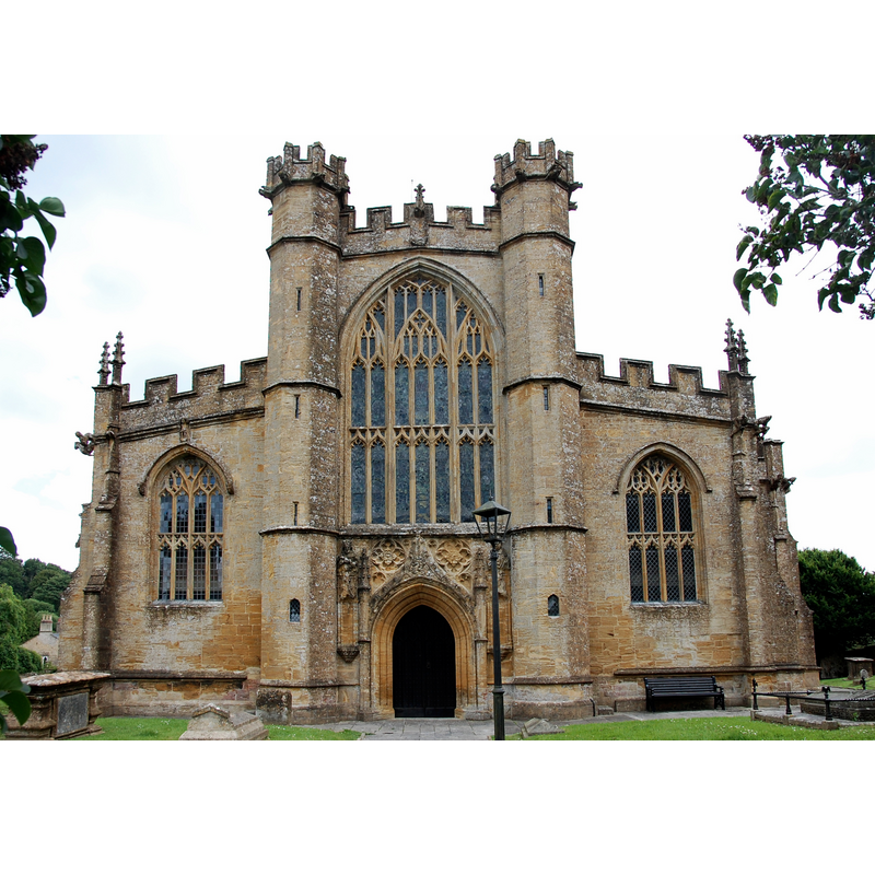 Source caption: "West front, St Bartholomew's Church. Pevsner likens the west front with its twin polygonal stair turrets to a 'Tudor royal chapel'.