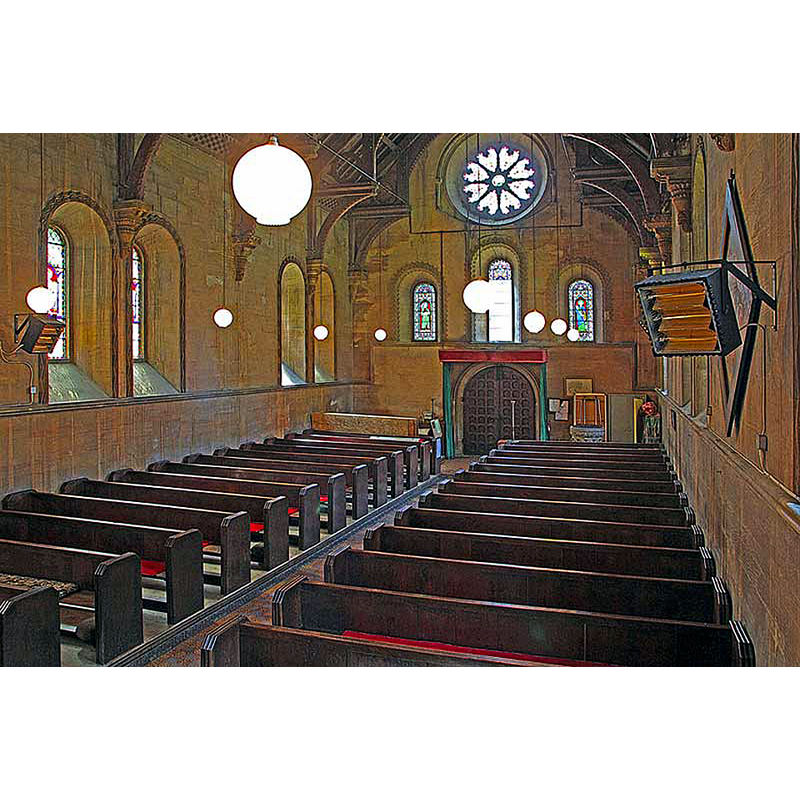 the medieval church was latest re-built and fitted in the mid-19thC in what Pevsner called a "hamfisted Norman" style